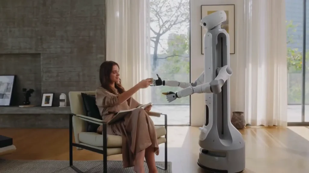 The Samsung Bot Handy, a personal assistant robot, handing a cup to a woman in a modern living room