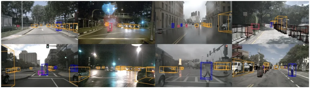 Example of 2D bounding box annotation on a highway scene, with cars, a truck, and road signs labeled for computer vision training