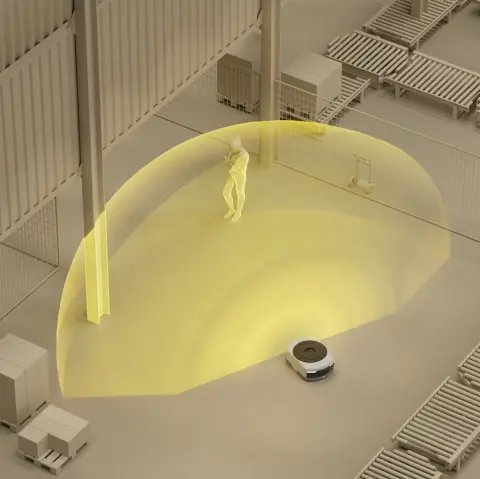 An autonomous mobile robot (AMR) in a warehouse using its sensors to create a yellow safety field to avoid a person