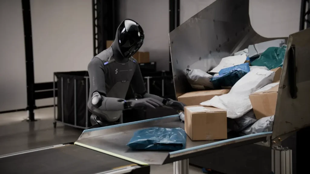 Figure humanoid robot unloading and sorting parcel boxes and bags onto a conveyor belt in a facility