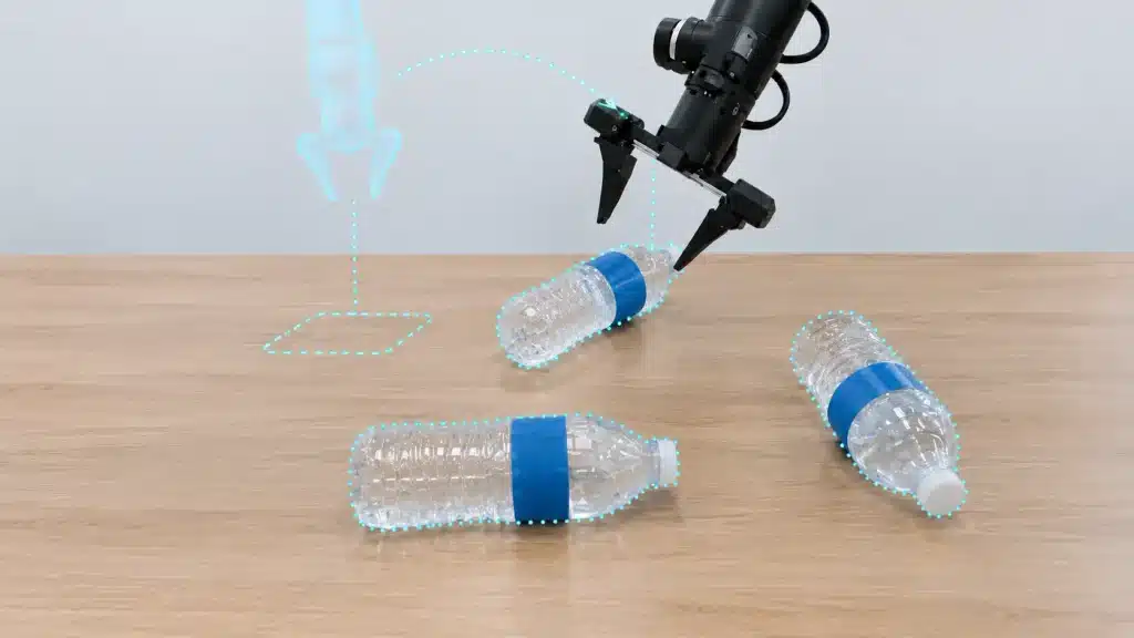 Robotic gripper using computer vision to pick and place water bottles on a table.